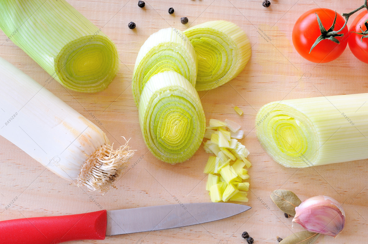 Tamron SP 24-70mm F2.8 Di VC USD sample photo. Leeks cut on a cutting board top view photography