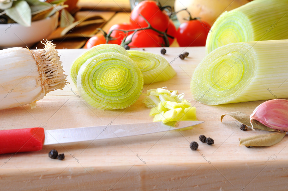 Tamron SP 24-70mm F2.8 Di VC USD sample photo. Leeks cut on a cutting board on a kitchen photography