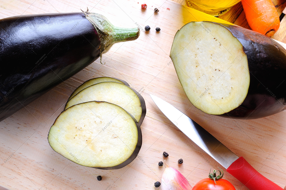 Tamron SP 24-70mm F2.8 Di VC USD sample photo. Eggplant prepared on cutting board top view photography