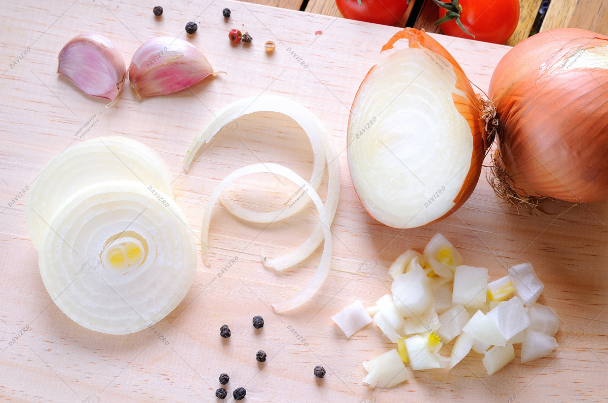 Tamron SP 24-70mm F2.8 Di VC USD sample photo. Onion prepared on cutting board top view photography