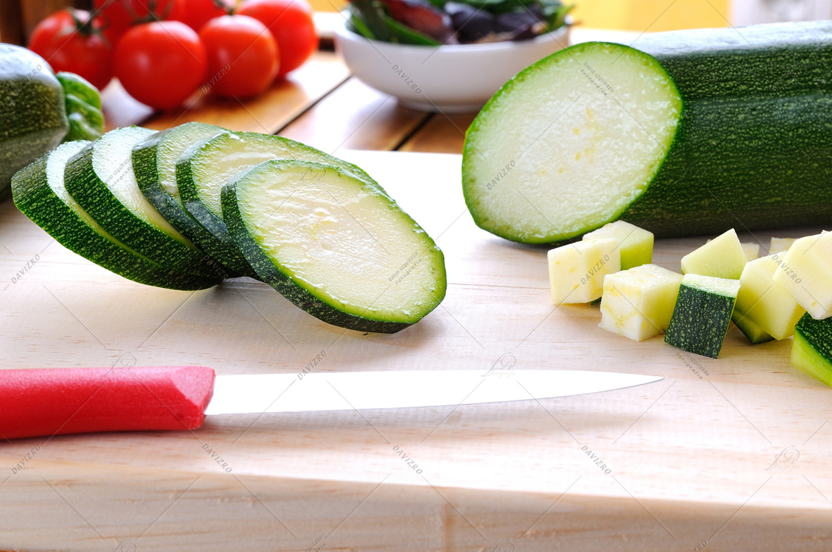 Tamron SP 24-70mm F2.8 Di VC USD sample photo. Green zucchini prepared on cutting board photography