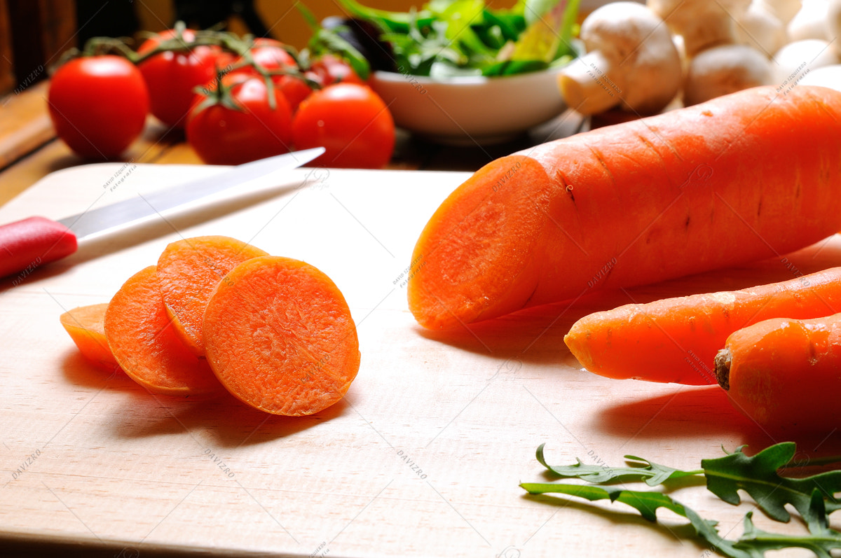 Nikon D300 + Tamron SP 24-70mm F2.8 Di VC USD sample photo. Carrots on a cutting board in the kitchen table photography