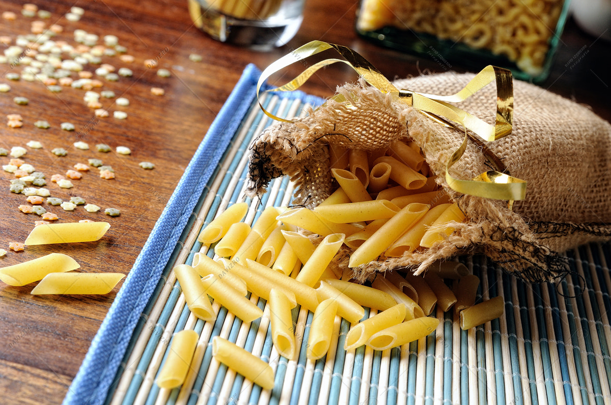 Tamron SP 24-70mm F2.8 Di VC USD sample photo. Uncooked macaroni composition out of a burlap sack photography