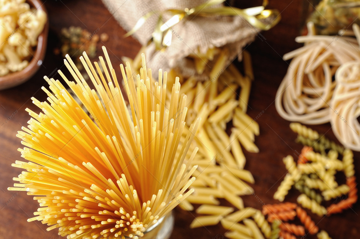 Nikon D300 + Tamron SP 24-70mm F2.8 Di VC USD sample photo. Spaghetti top view with different kinds of pasta background photography