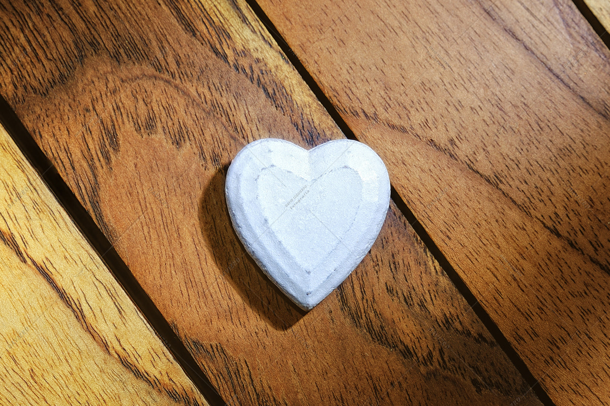 Tamron SP 24-70mm F2.8 Di VC USD sample photo. White heart with wooden background photography