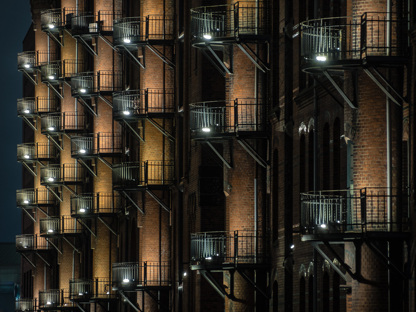 Olympus OM-D E-M5 sample photo. Fire escape balconies photography