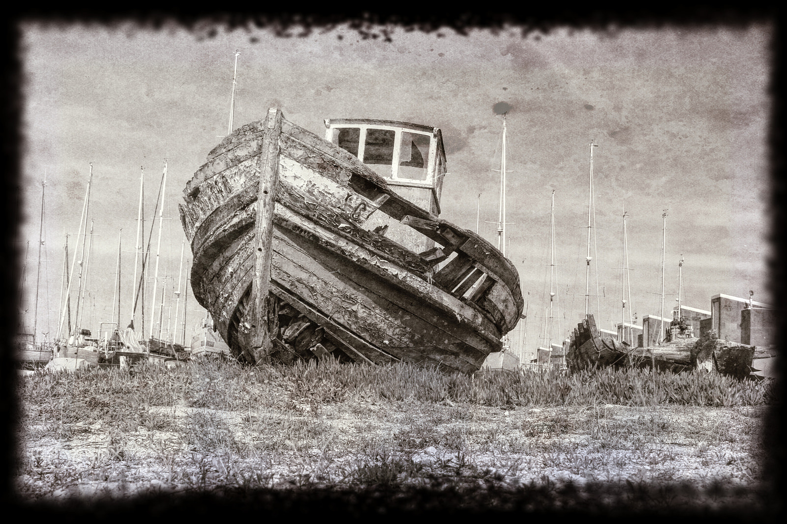 Canon EF 28-300mm F3.5-5.6L IS USM sample photo. Oldboat with faded glory photography