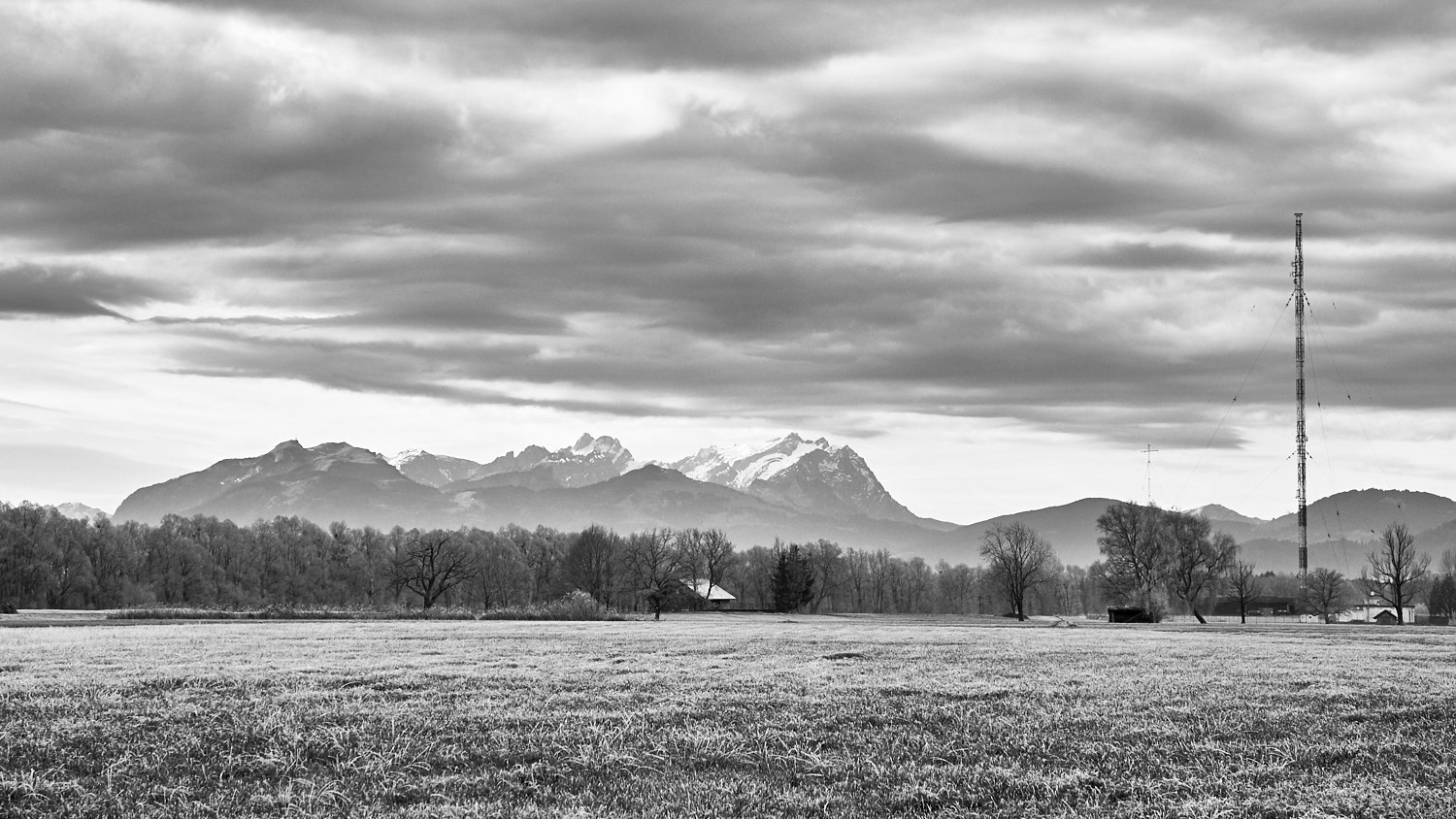 Olympus M.ZUIKO DIGITAL ED 12-40mm 1:2.8 sample photo. Heavy clouds above the swiss alps photography