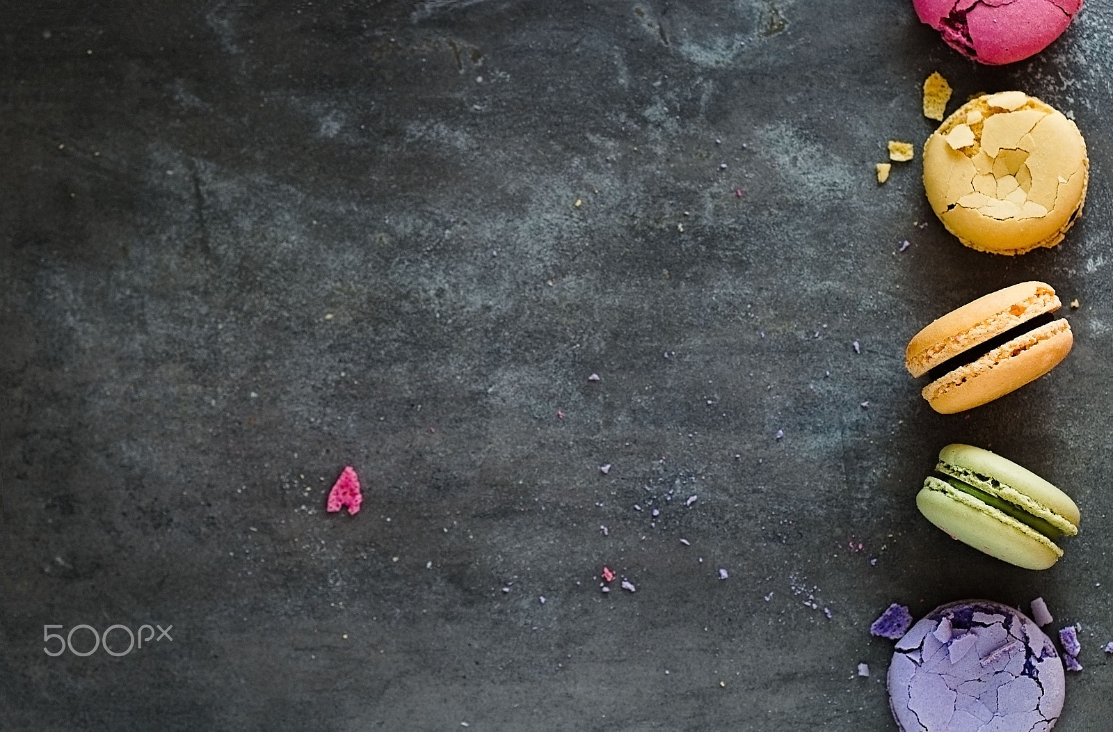 Fujifilm X-E2 + Fujifilm XF 90mm F2 R LM WR sample photo. Assorted colorful french  macaroons on a dark stone background photography