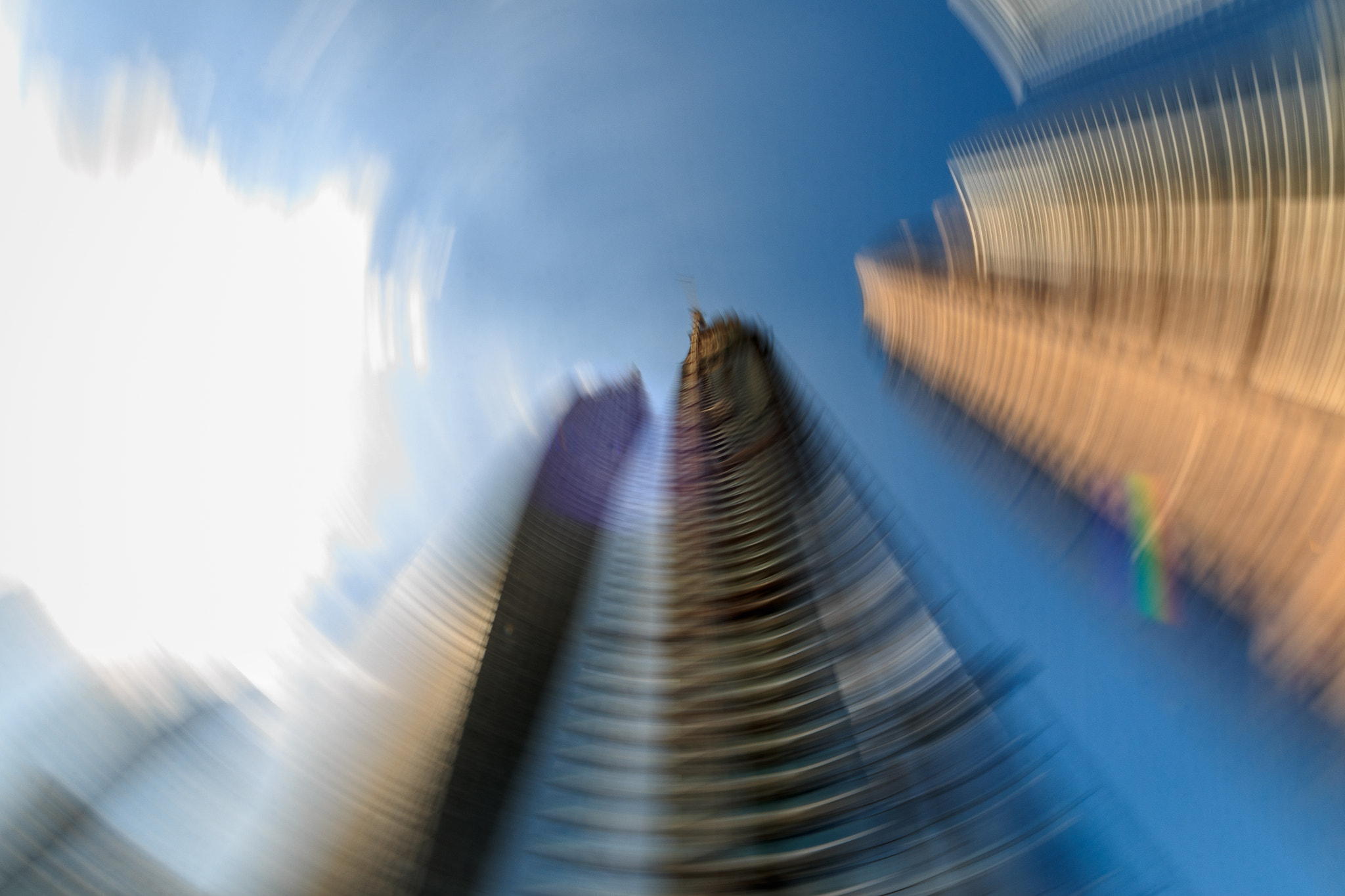 Sigma 8-16mm F4.5-5.6 DC HSM sample photo. Spinning cityscape photography