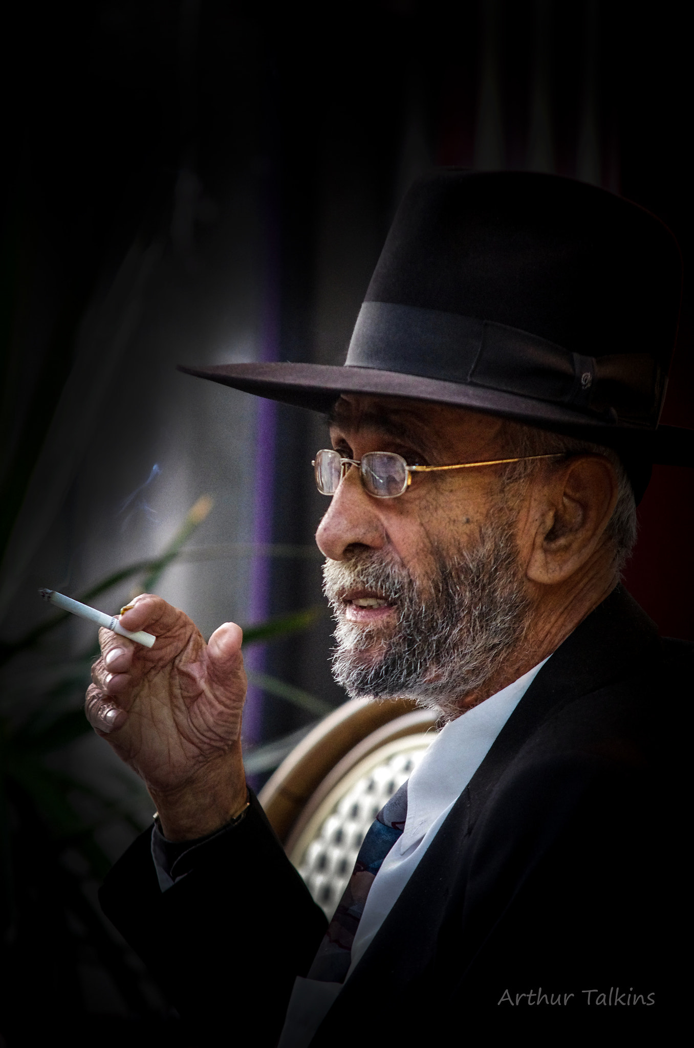 Sigma 70-200mm F2.8 EX DG Macro HSM II sample photo. Portrait of a chilled smoker... photography