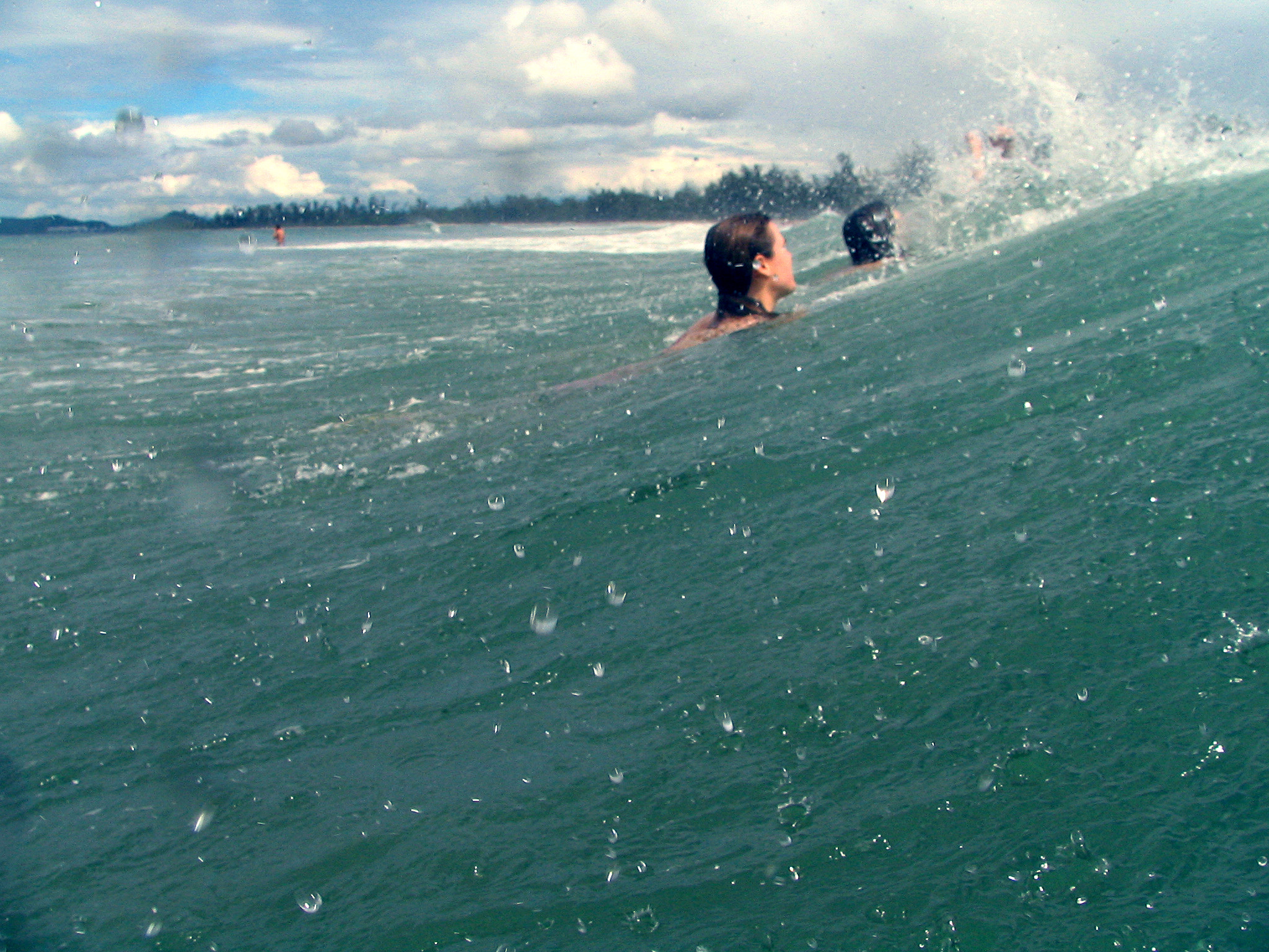 Canon POWERSHOT S1 IS sample photo. Woman swimming in a wave photography