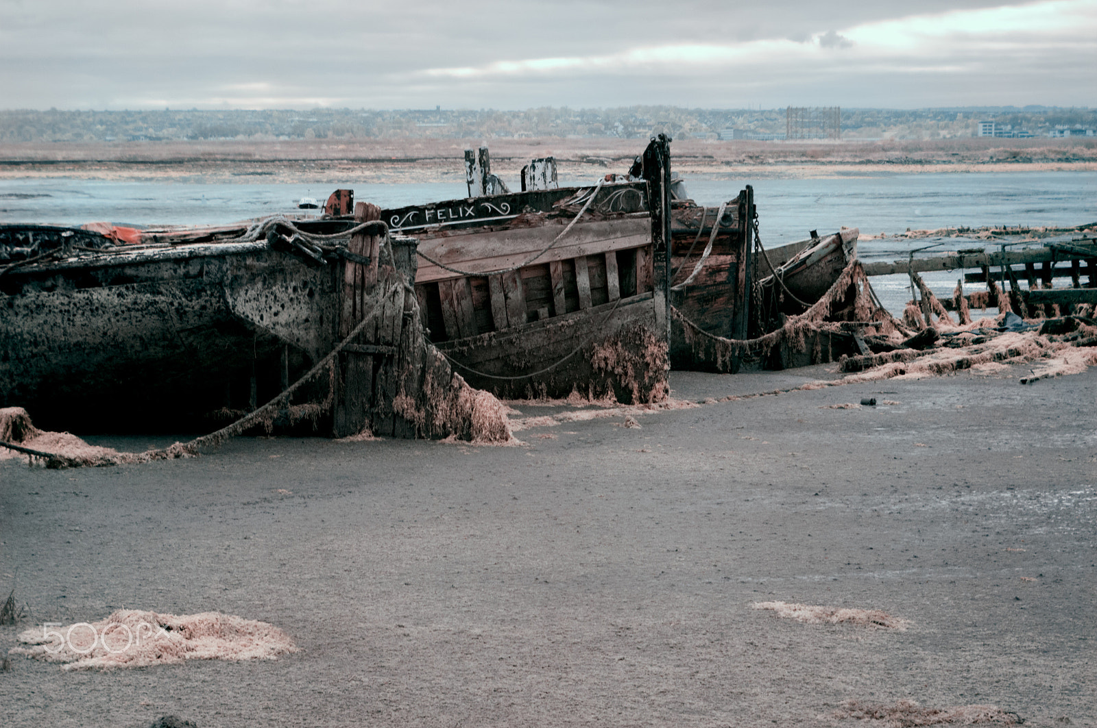 Pentax K-7 sample photo. Shipwreck in the mud photography