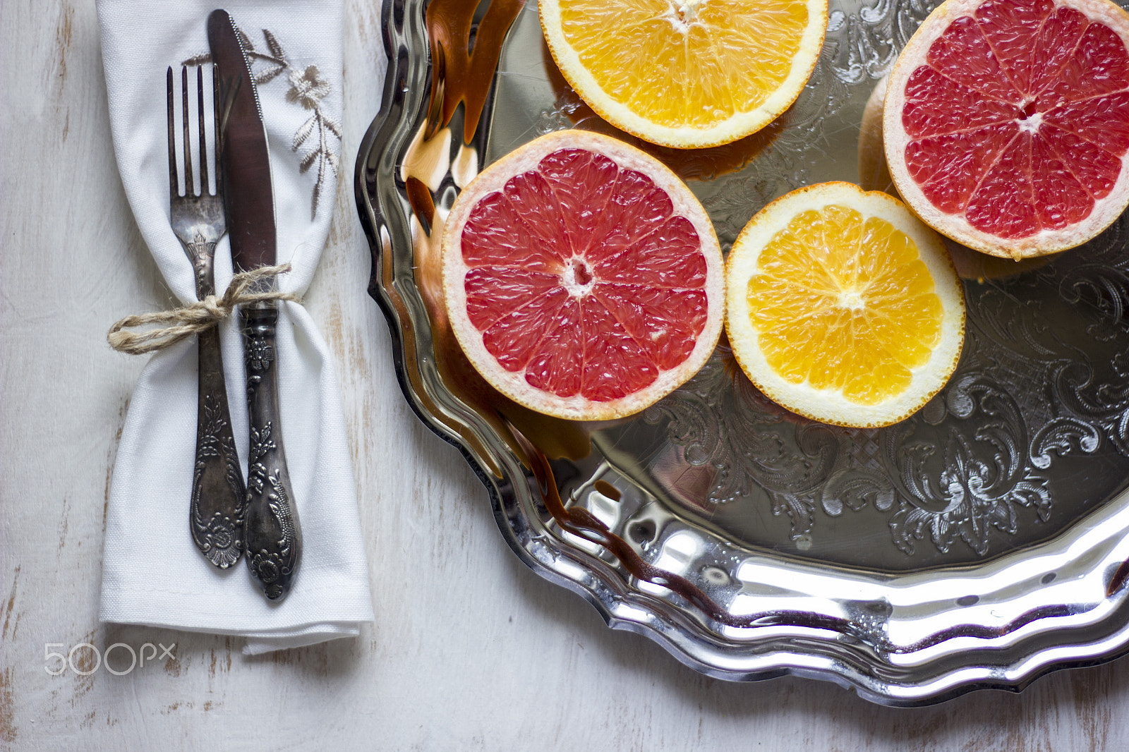Canon EOS 550D (EOS Rebel T2i / EOS Kiss X4) sample photo. A composition of grey fruits and oranges served on photography