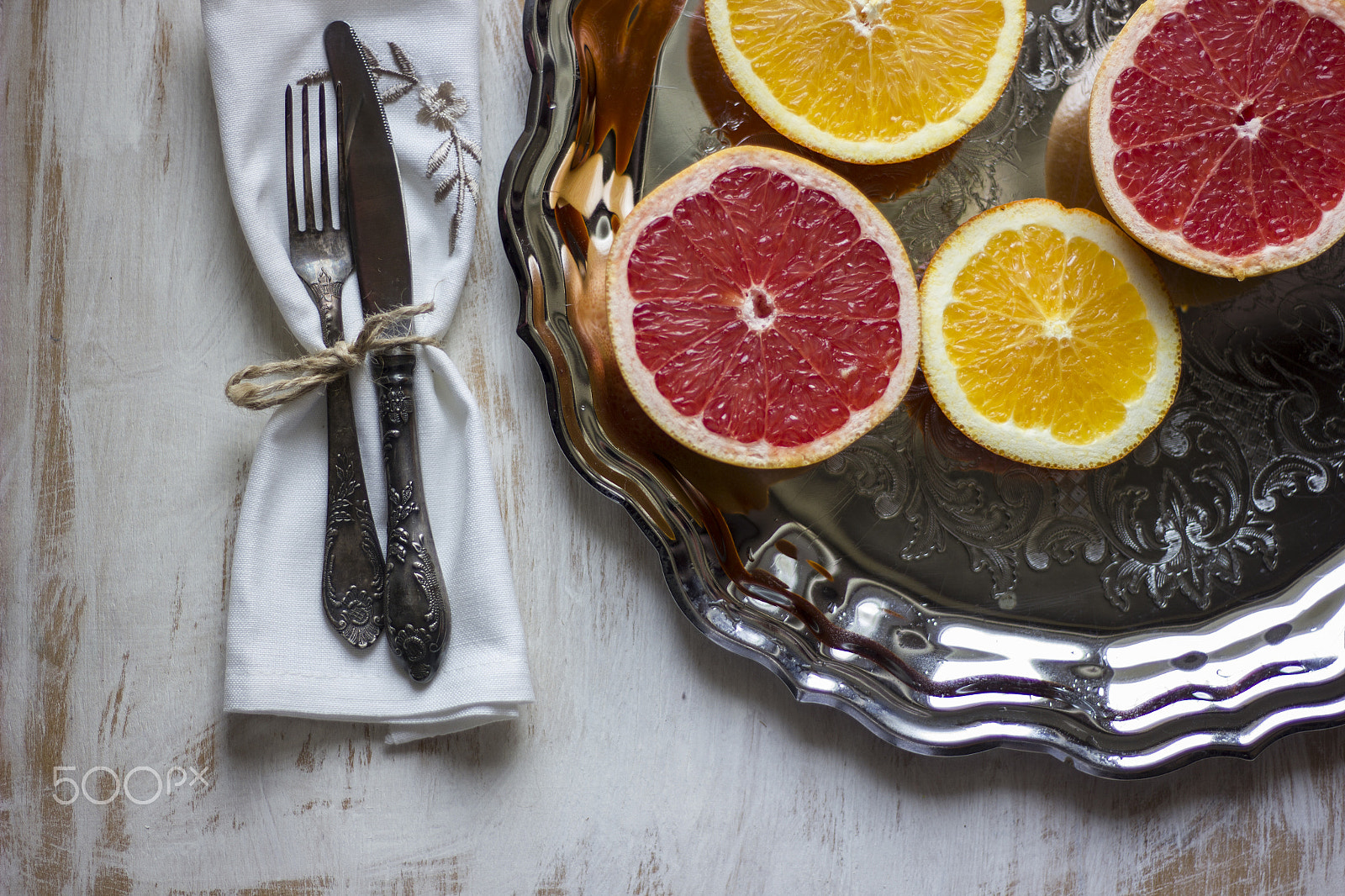 Canon EOS 550D (EOS Rebel T2i / EOS Kiss X4) sample photo. A composition of grey fruits and oranges served on photography