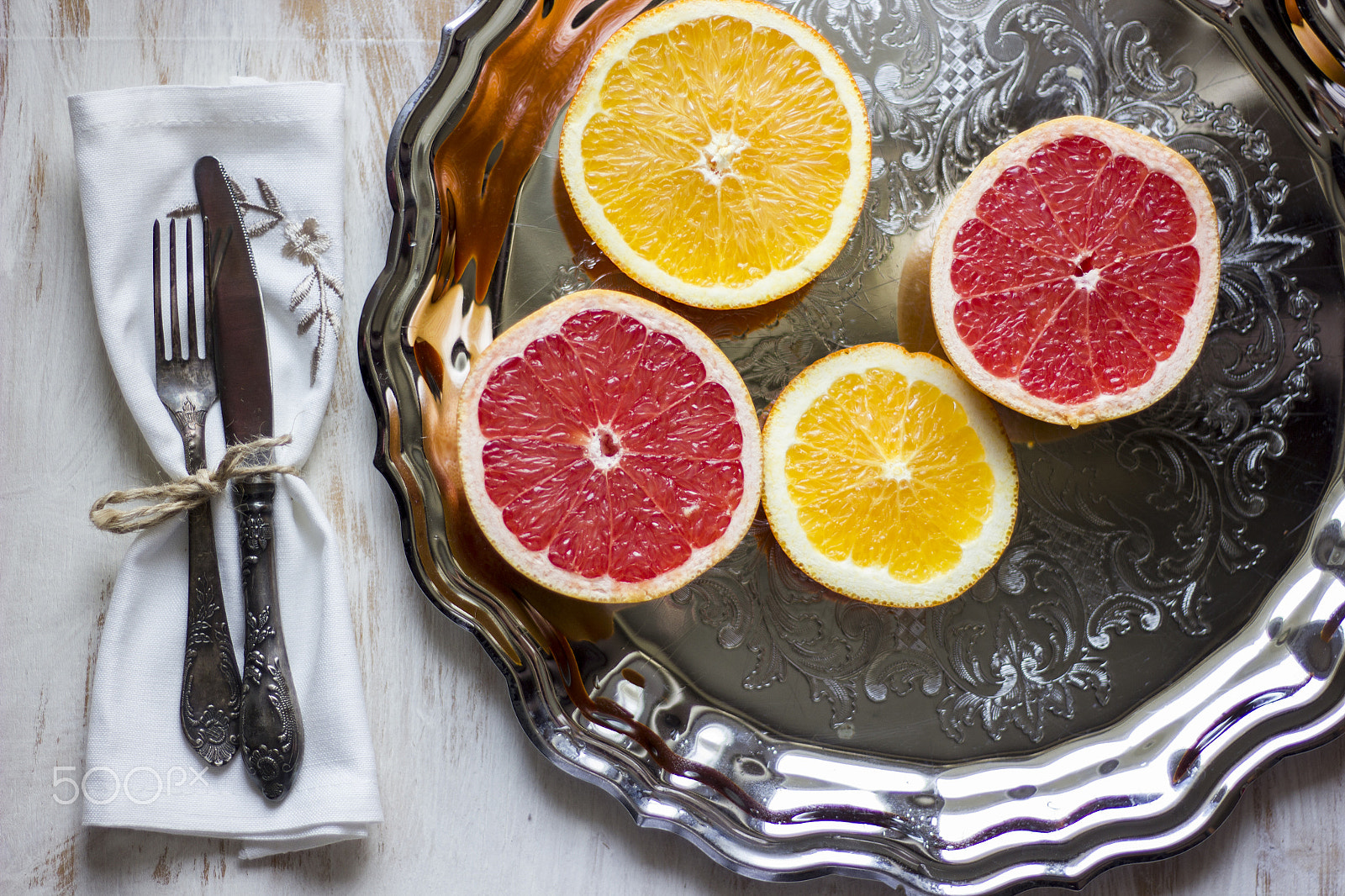 Canon EOS 550D (EOS Rebel T2i / EOS Kiss X4) sample photo. A composition of grey fruits and oranges served on photography