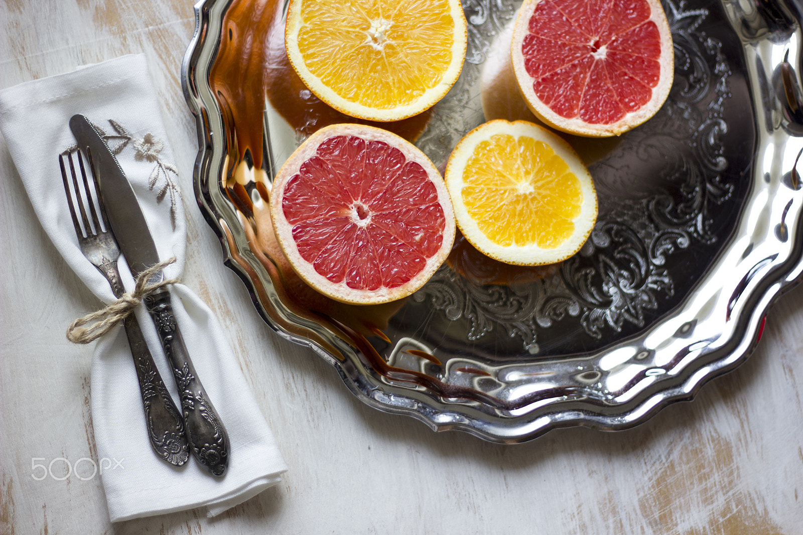 Canon EOS 550D (EOS Rebel T2i / EOS Kiss X4) sample photo. A composition of grey fruits and oranges served on photography