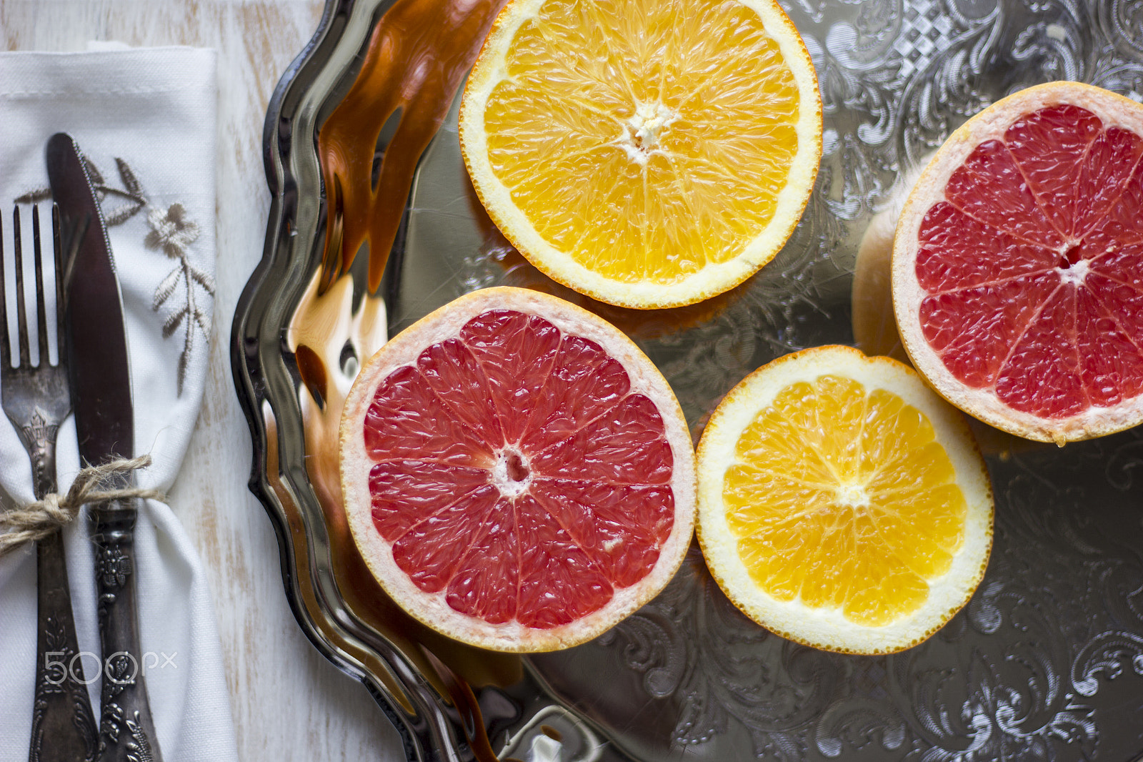 Canon EOS 550D (EOS Rebel T2i / EOS Kiss X4) sample photo. A composition of grey fruits and oranges served on photography
