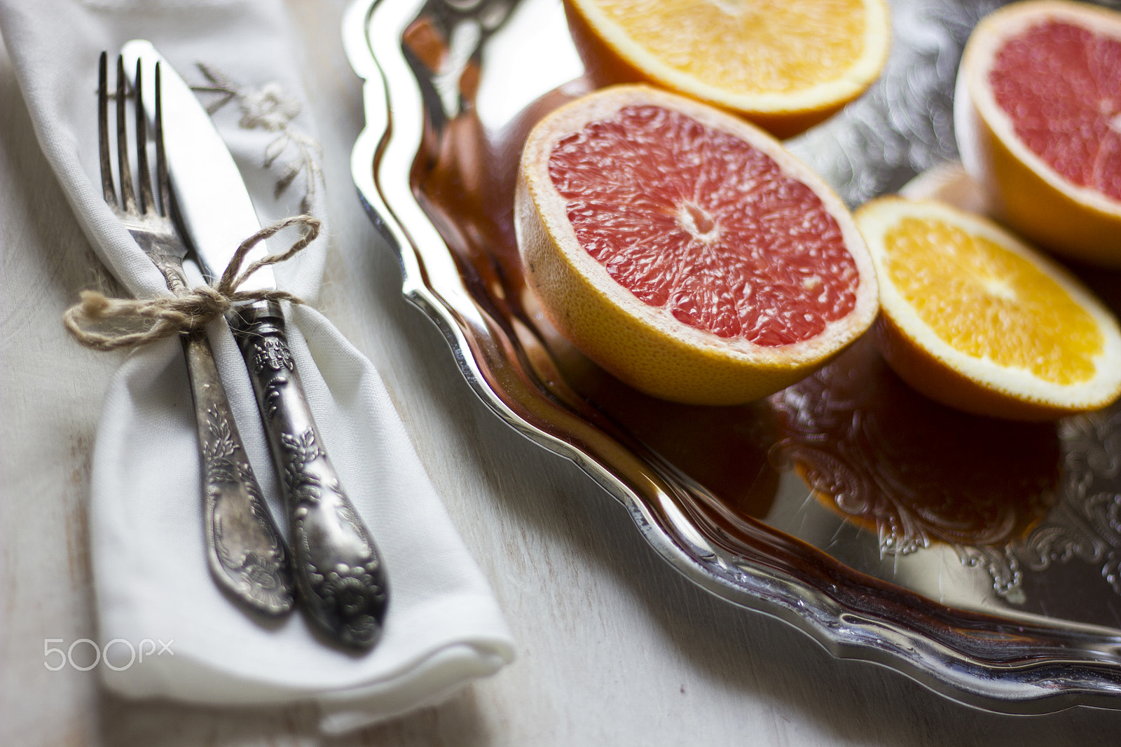 Canon EOS 550D (EOS Rebel T2i / EOS Kiss X4) sample photo. A composition of grey fruits and oranges served on photography