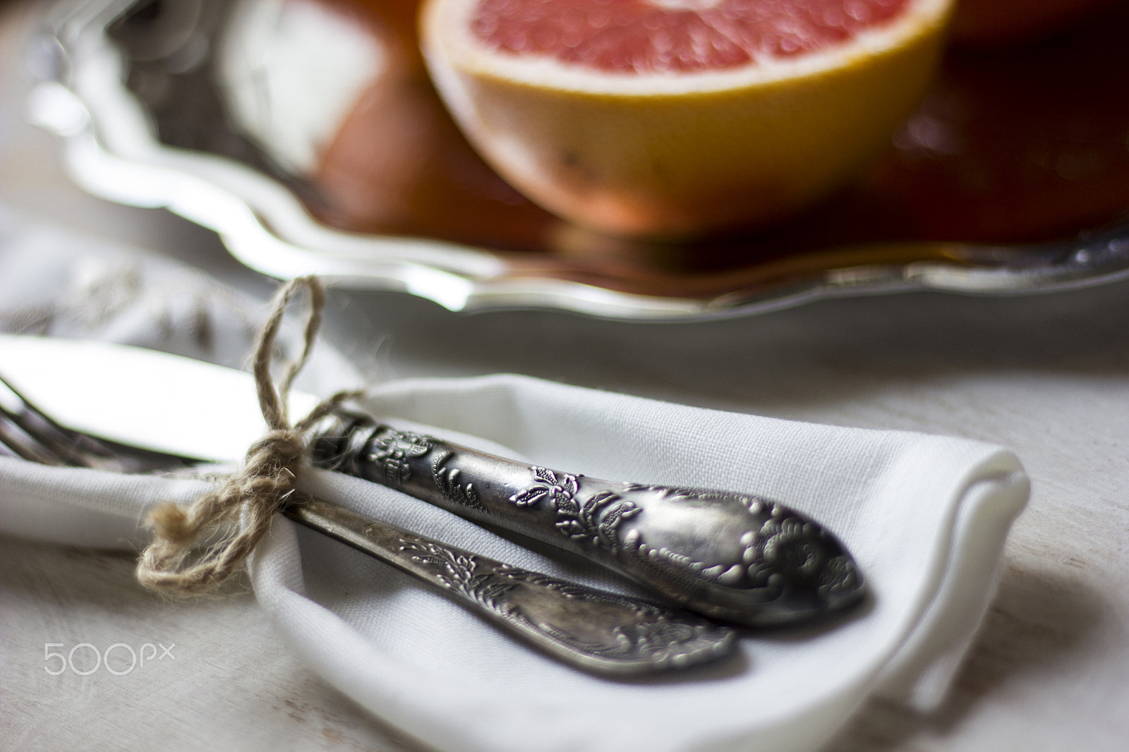 Canon EOS 550D (EOS Rebel T2i / EOS Kiss X4) sample photo. A composition of grey fruits and oranges served on photography