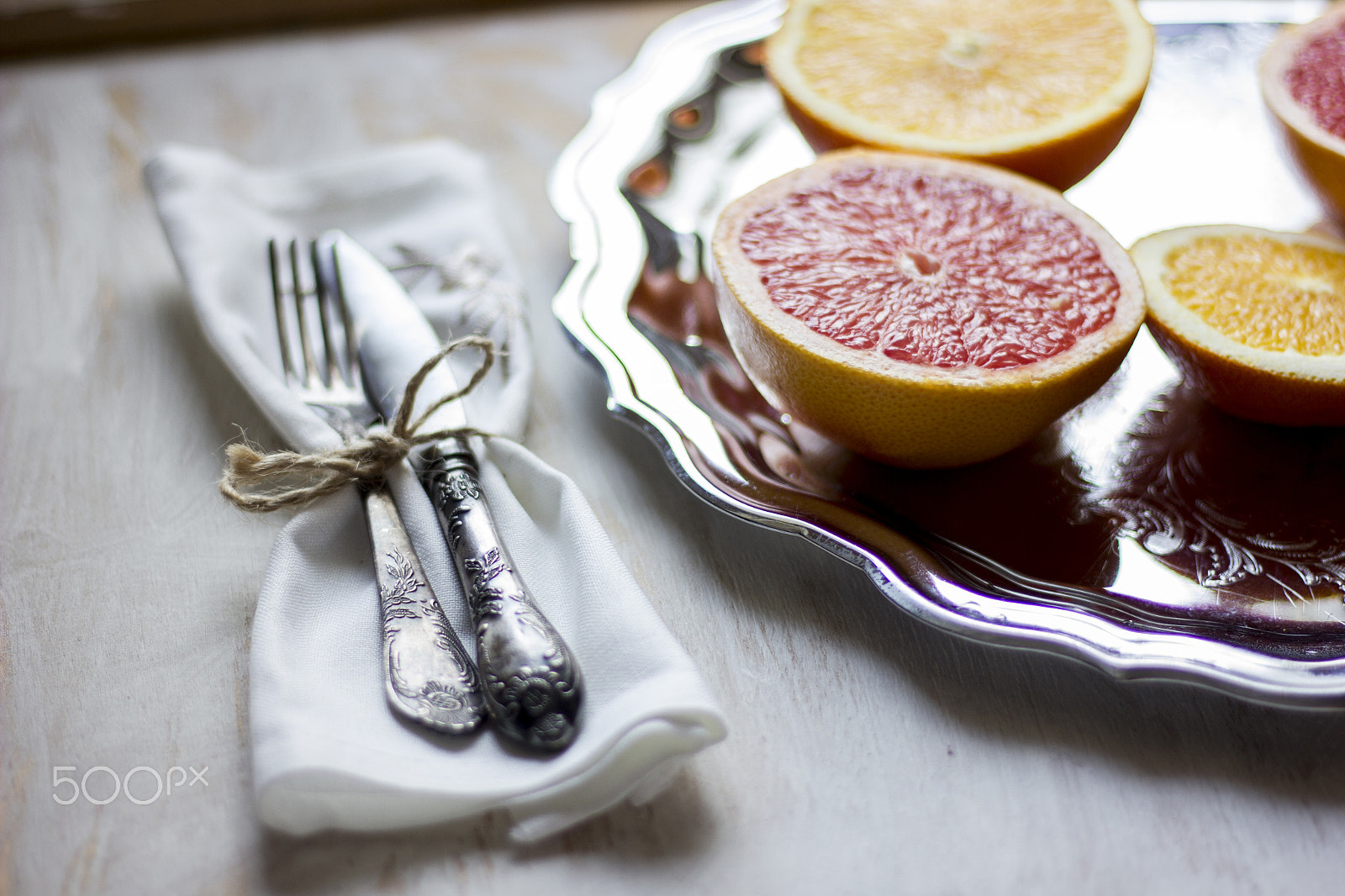 Canon EOS 550D (EOS Rebel T2i / EOS Kiss X4) sample photo. A composition of grey fruits and oranges served on photography