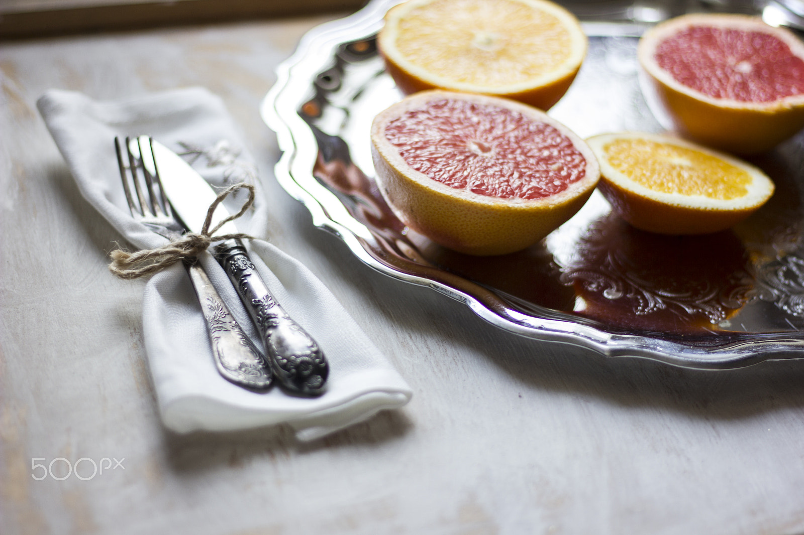 Canon EOS 550D (EOS Rebel T2i / EOS Kiss X4) sample photo. A composition of grey fruits and oranges served on photography