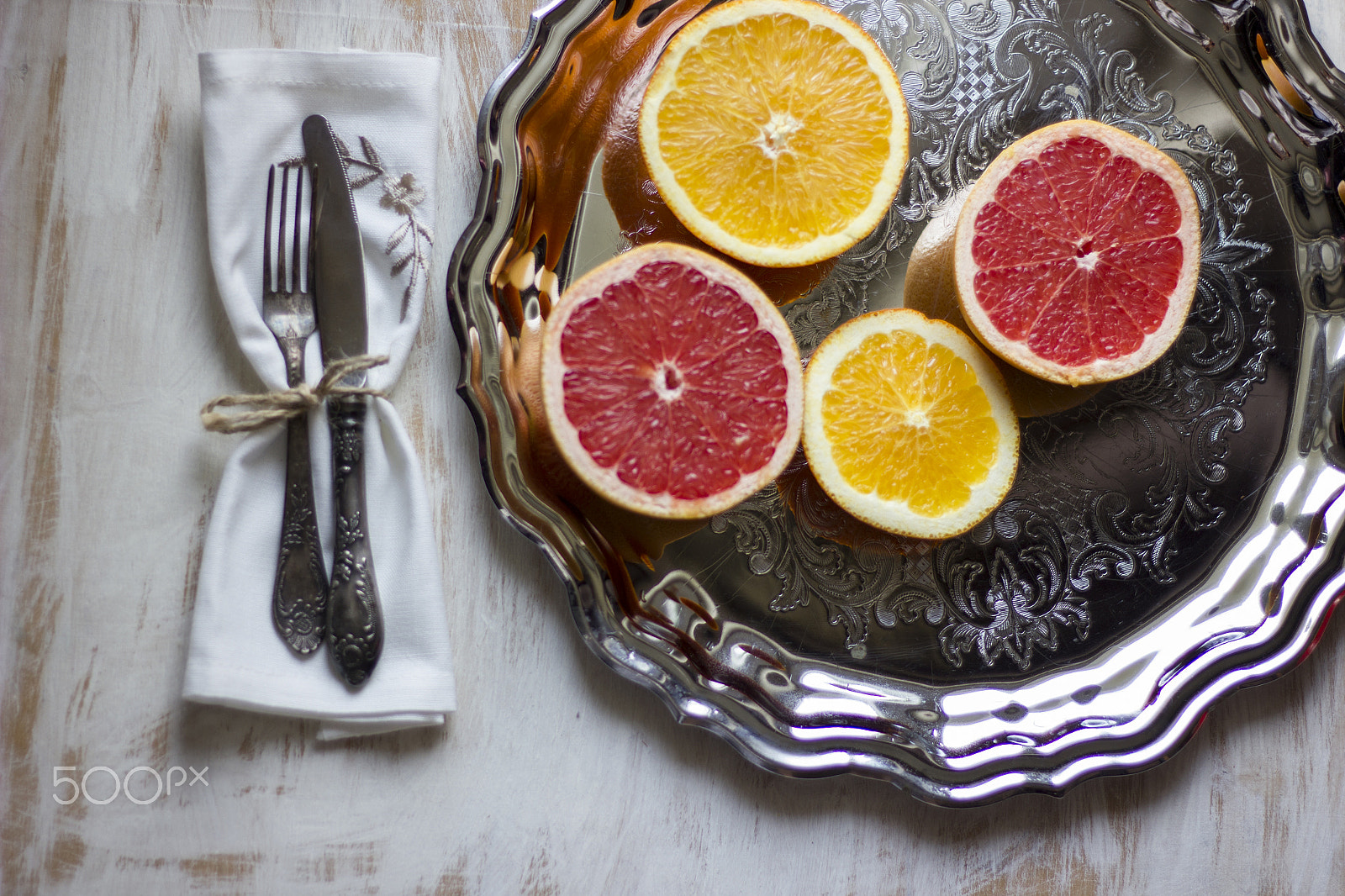 Canon EOS 550D (EOS Rebel T2i / EOS Kiss X4) sample photo. A composition of grey fruits and oranges served on photography