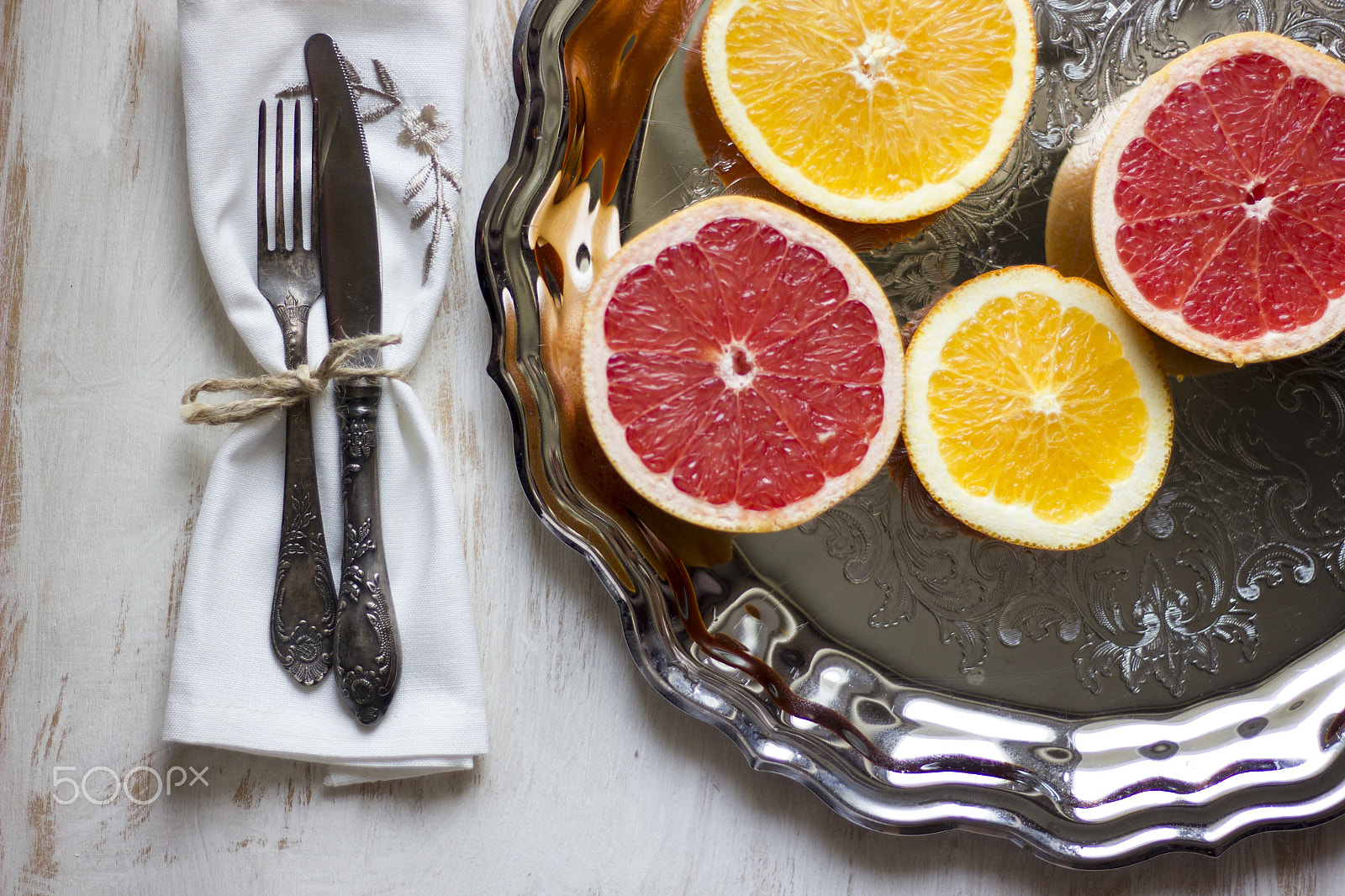 Canon EOS 550D (EOS Rebel T2i / EOS Kiss X4) sample photo. A composition of grey fruits and oranges served on photography