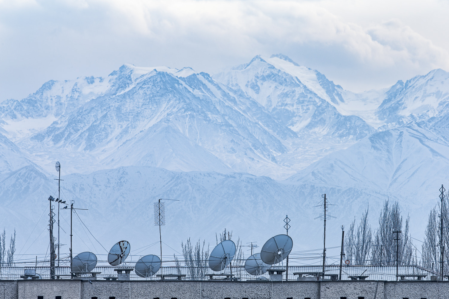 Canon EF 300mm F2.8L IS II USM sample photo. Bishkek apartments in front of ala-too mountain range photography