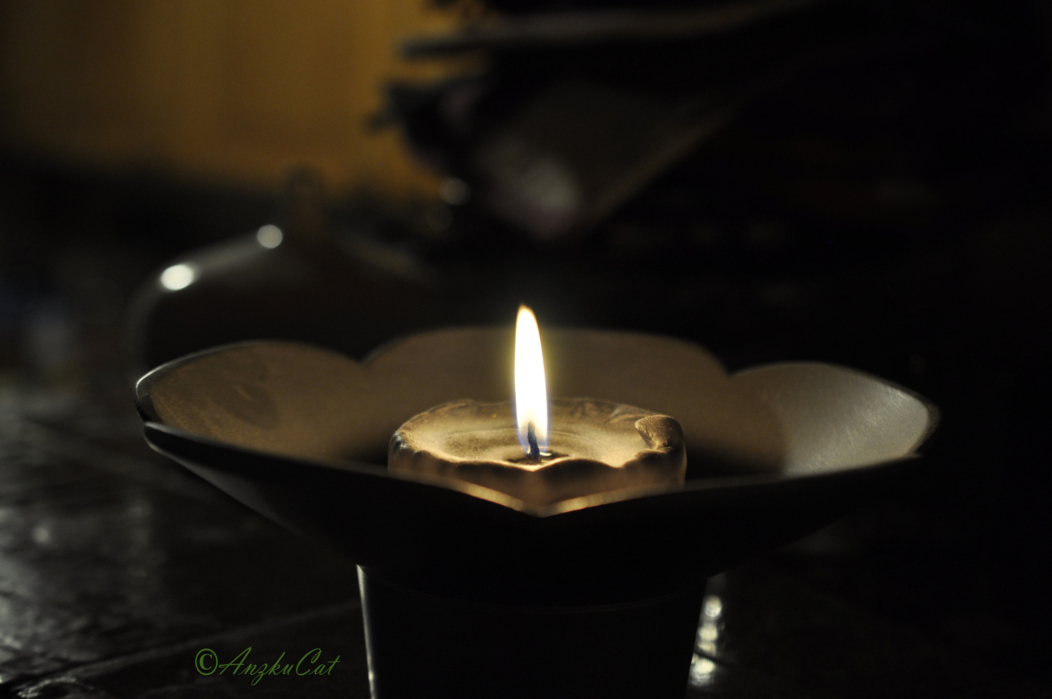 Nikon D90 + Nikon AF-S DX Micro Nikkor 40mm F2.8 sample photo. Silver candle in darkness photography
