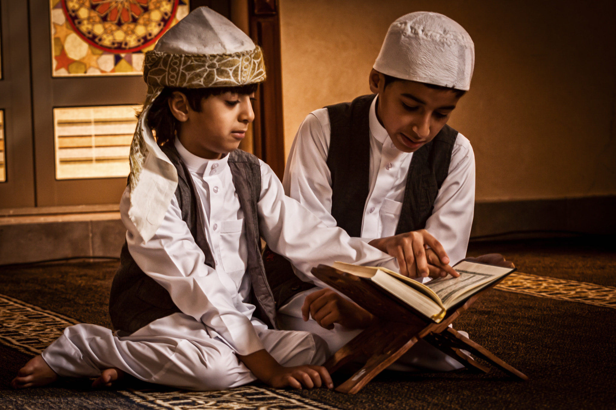 Canon EF 70-200mm F2.8L USM sample photo. Reading together the holy book  photography