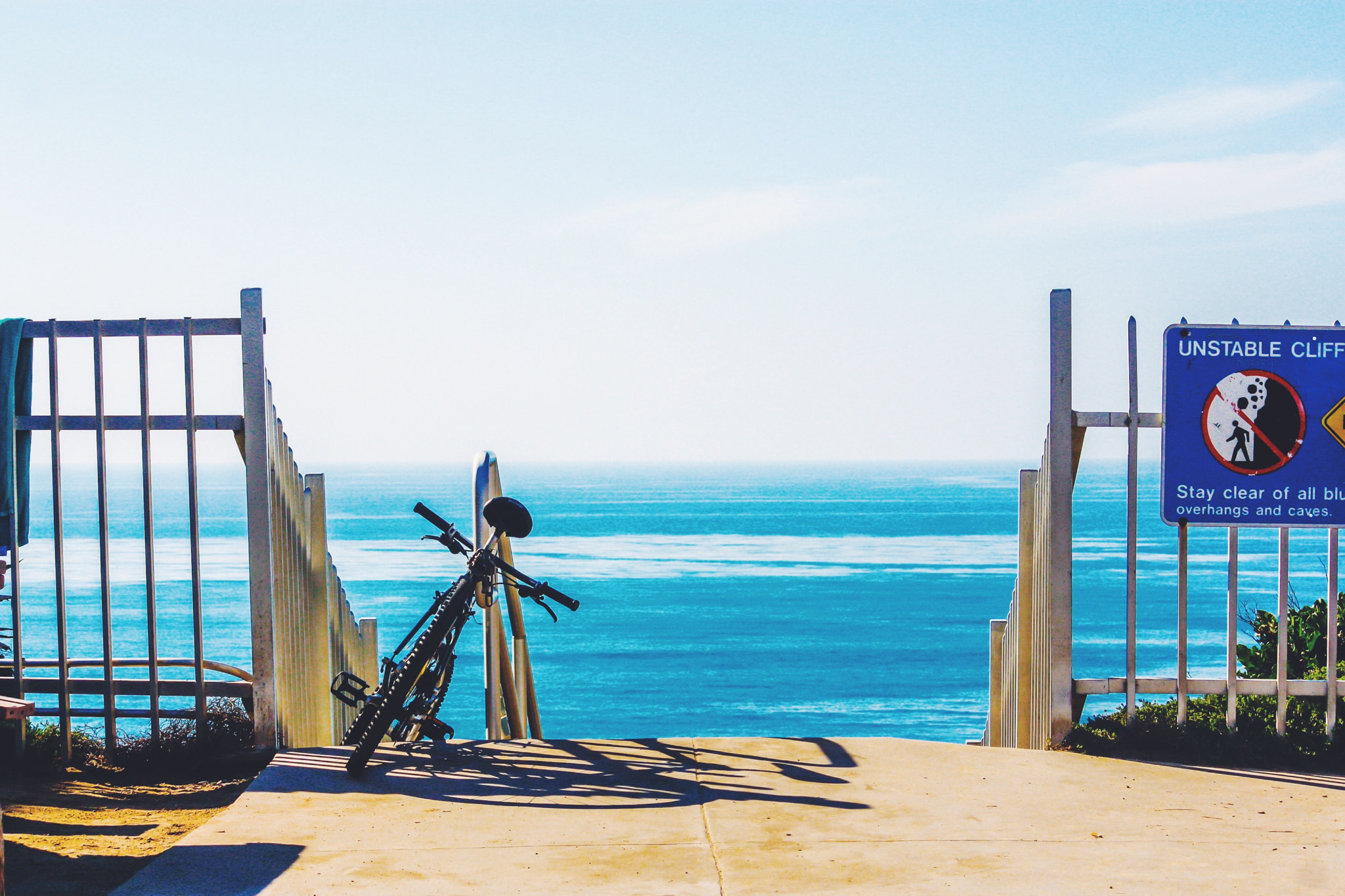 Canon EF-S 55-250mm F4-5.6 IS sample photo. Bicycle by the sea photography