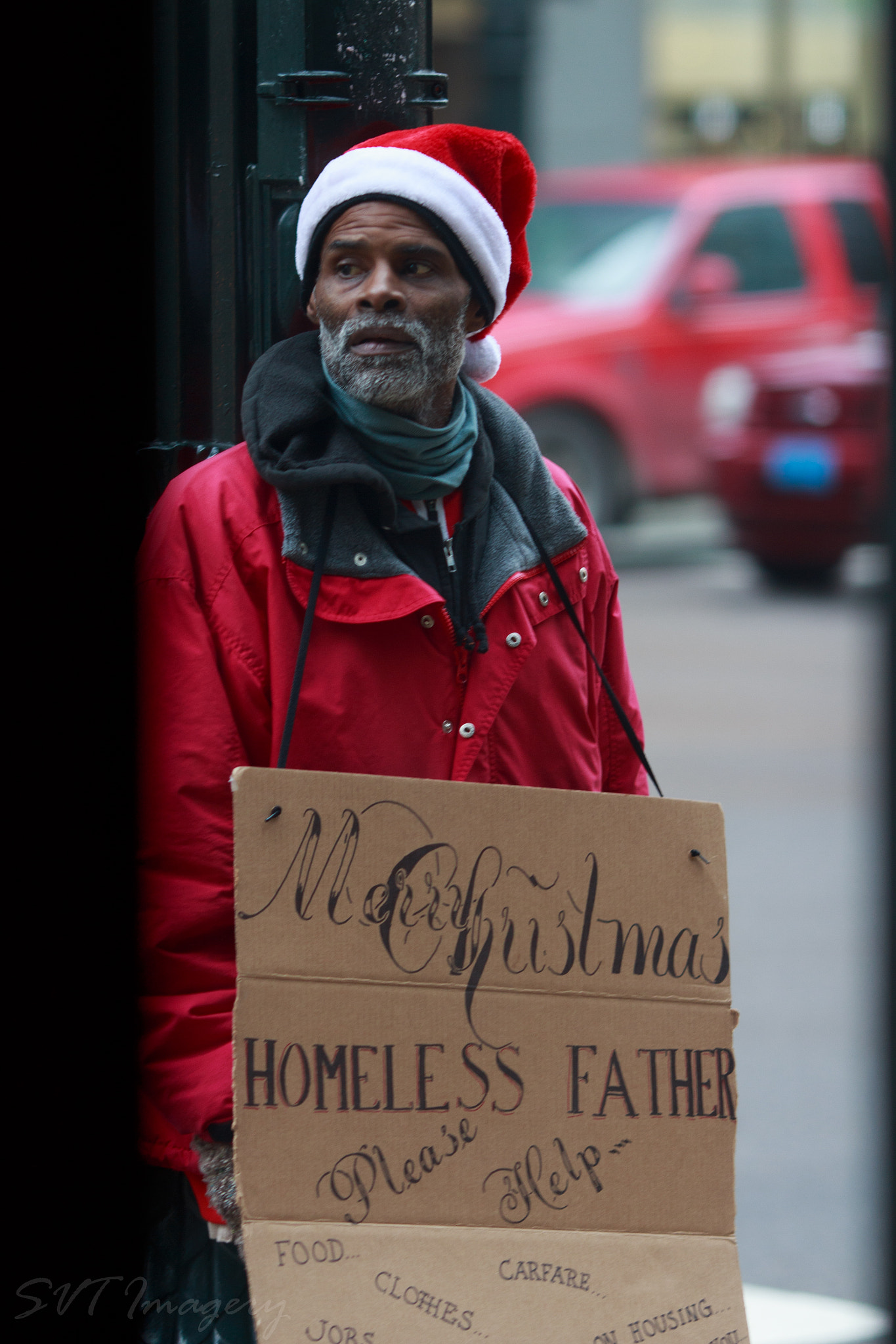 Canon EOS 700D (EOS Rebel T5i / EOS Kiss X7i) + Canon EF 135mm F2L USM sample photo. Homeless santa photography