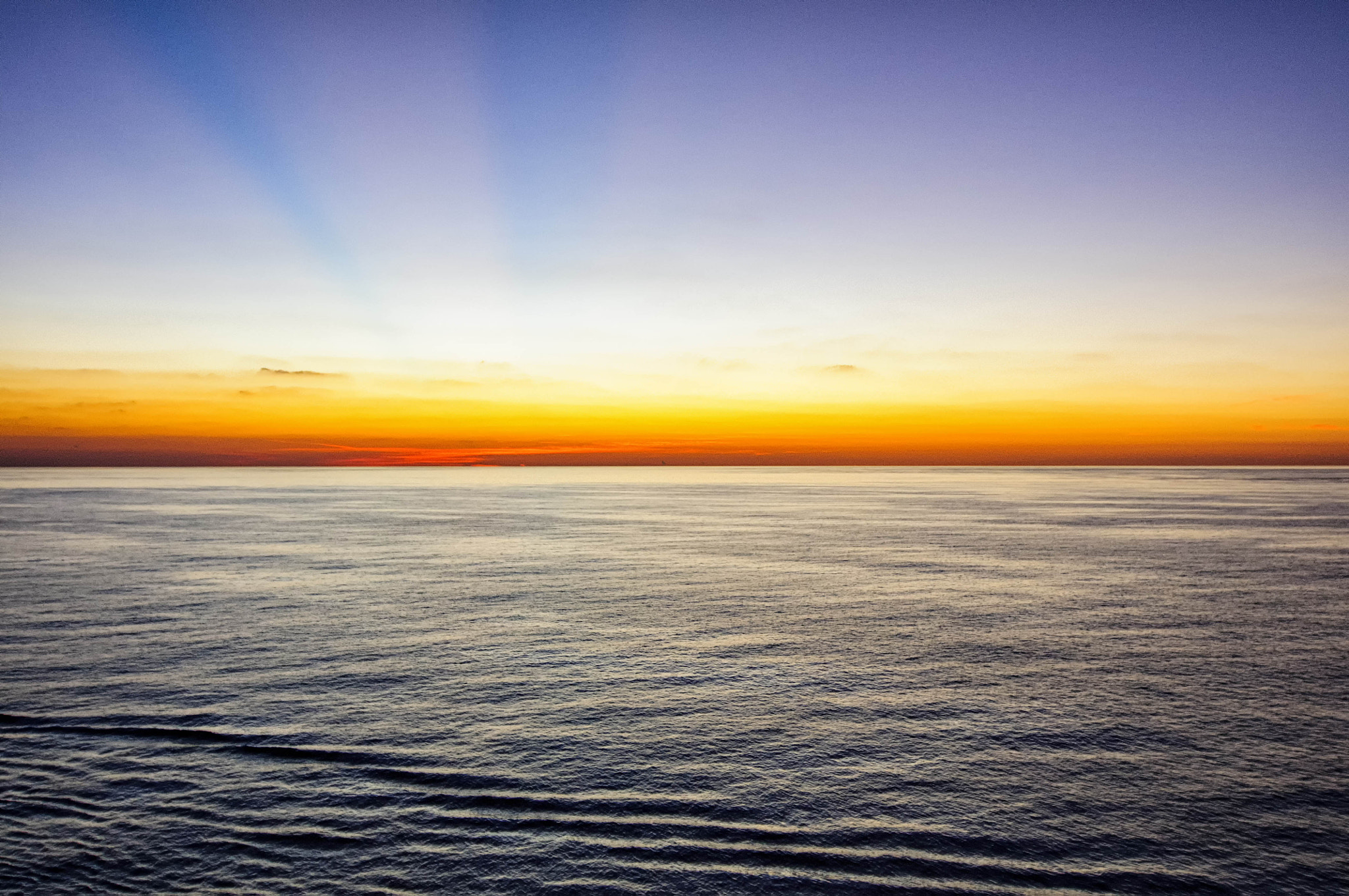 Tokina AT-X Pro 12-24mm F4 (IF) DX sample photo. The colors of sunrise over the ocean near the bahamas photography