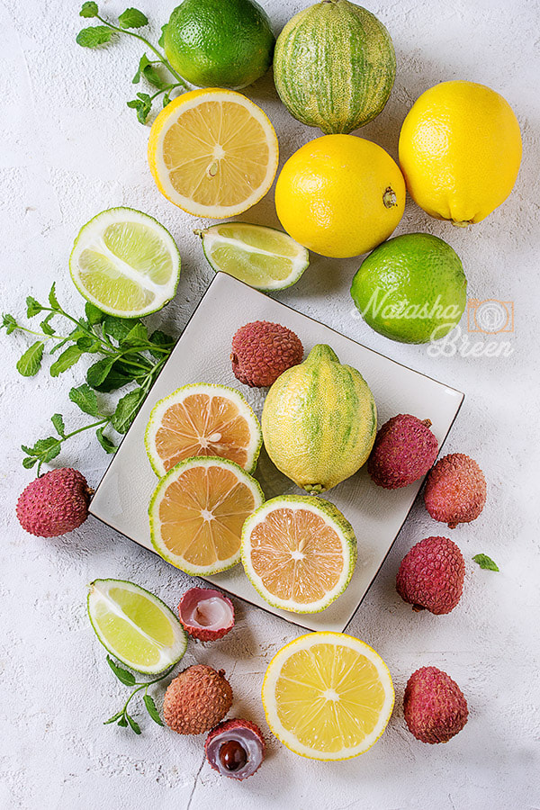 Canon EOS 700D (EOS Rebel T5i / EOS Kiss X7i) + Canon EF 70-200mm F4L IS USM sample photo. Variety of citrus fruits with tiger lemon photography