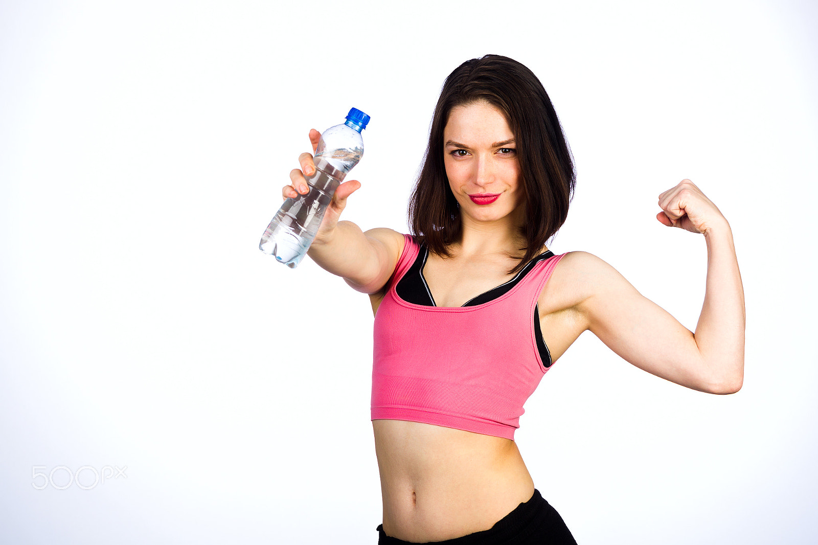 Canon EOS-1D Mark IV sample photo. Young woman in sportswear with a bottle of drinking water photography