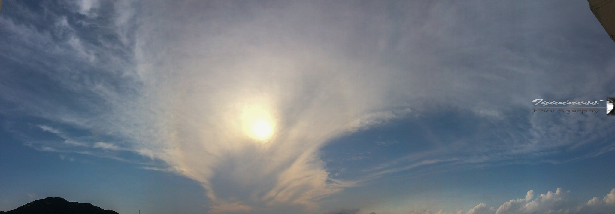 iPad mini 2 back camera 3.3mm f/2.4 sample photo. Solar halo photography