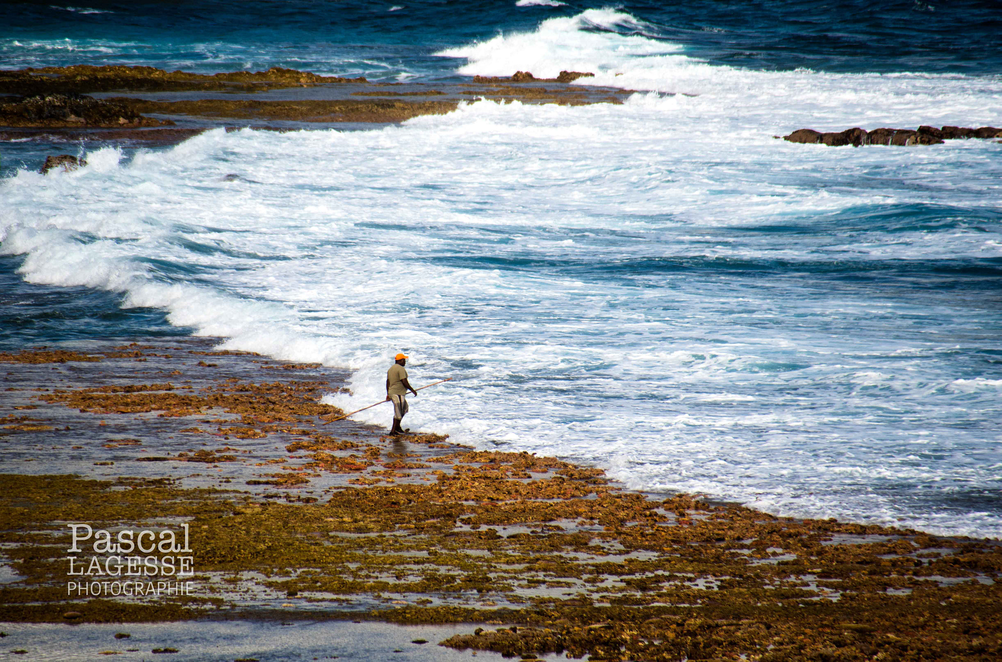Sigma 18-250mm F3.5-6.3 DC Macro OS HSM sample photo. Fisherman on the reefs photography