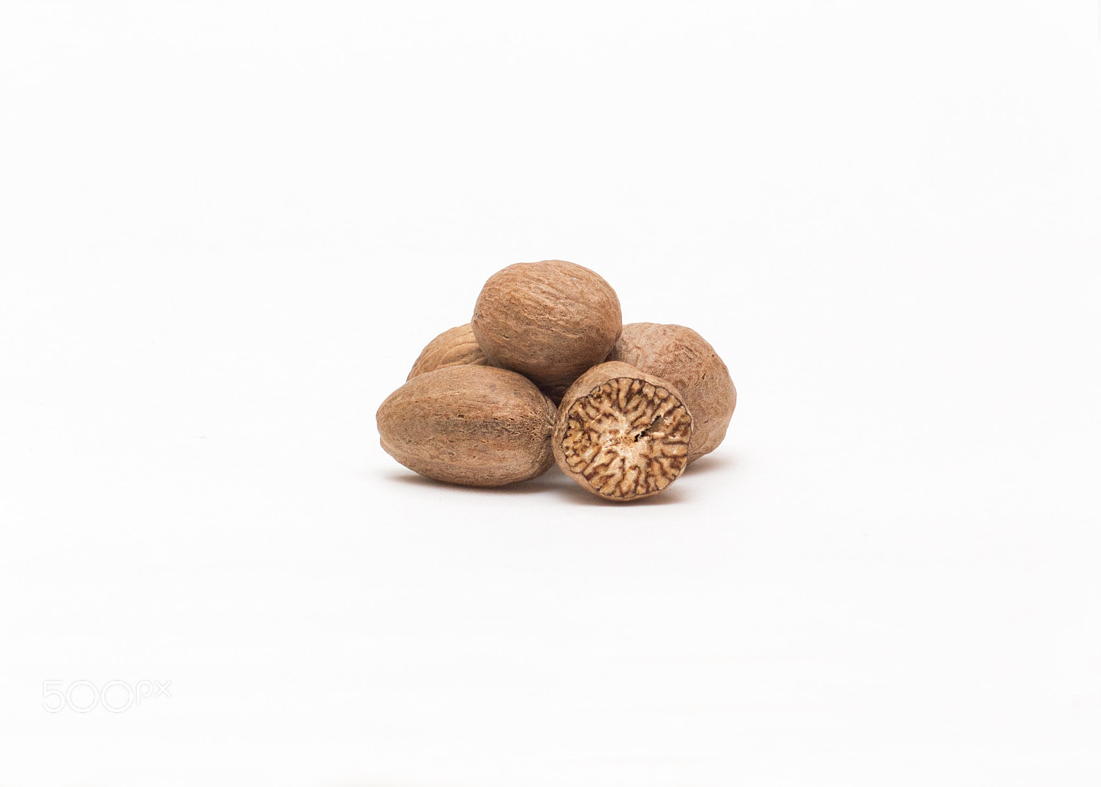 Nikon D7100 + Nikon AF Nikkor 50mm F1.4D sample photo. Nutmeg isolated on white background with shadow photography