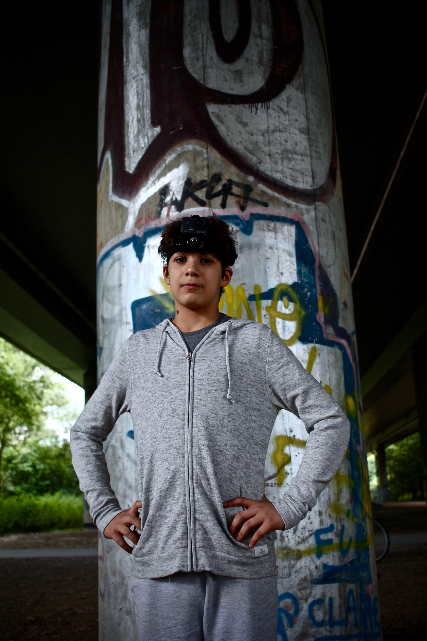 Canon EF-S 24mm F2.8 STM sample photo. Boy under the bridge photography