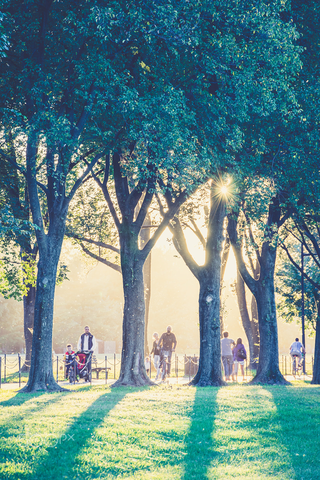 Sony a7 II sample photo. People walking in colorful park photography