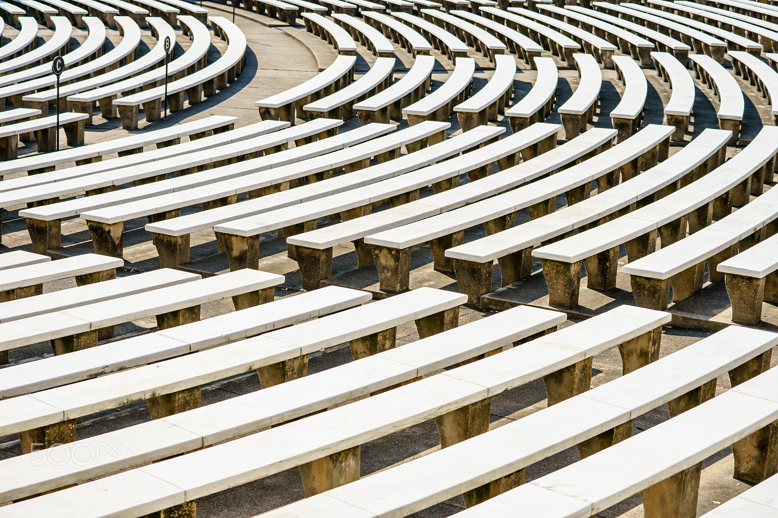 Sony a7 II + Tamron SP 70-300mm F4-5.6 Di USD sample photo. Benches in amphitheater photography