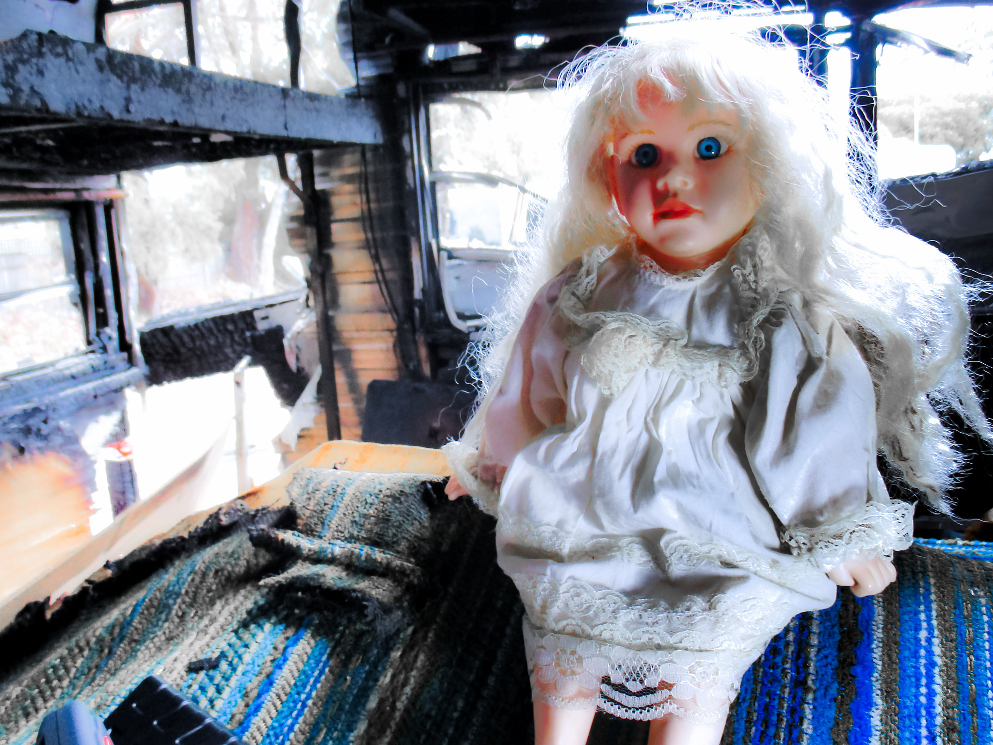 Canon PowerShot ELPH 160 (IXUS 160 / IXY 150) sample photo. Doll in burnt out trailer photography