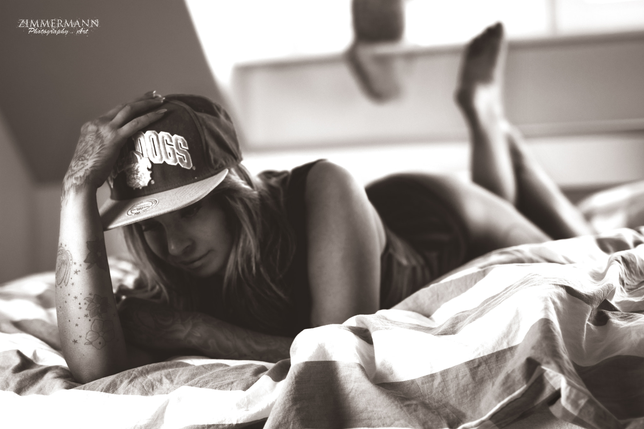 Sigma 50mm F1.4 EX DG HSM sample photo. Snapback in bed photography