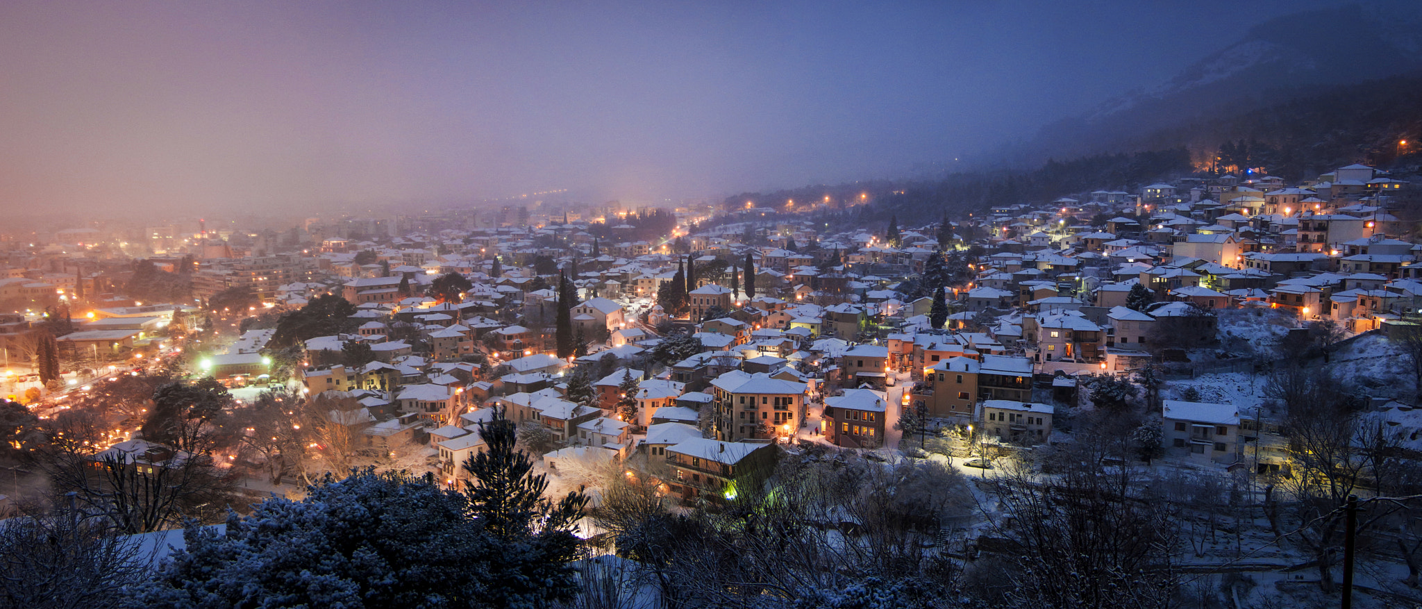 Fujifilm FinePix S6000fd sample photo. Snowy old town of xanthi by night photography