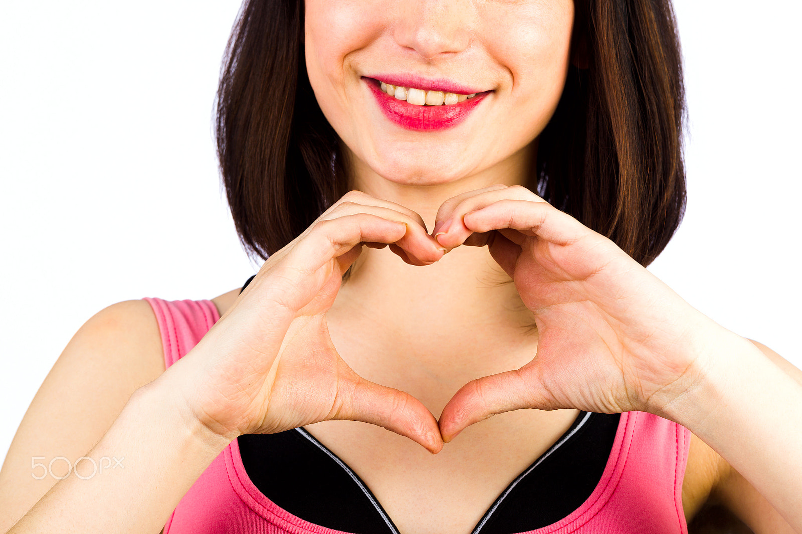 Canon EOS-1D Mark IV sample photo. Female hands in the form of heart on the background of a smile photography