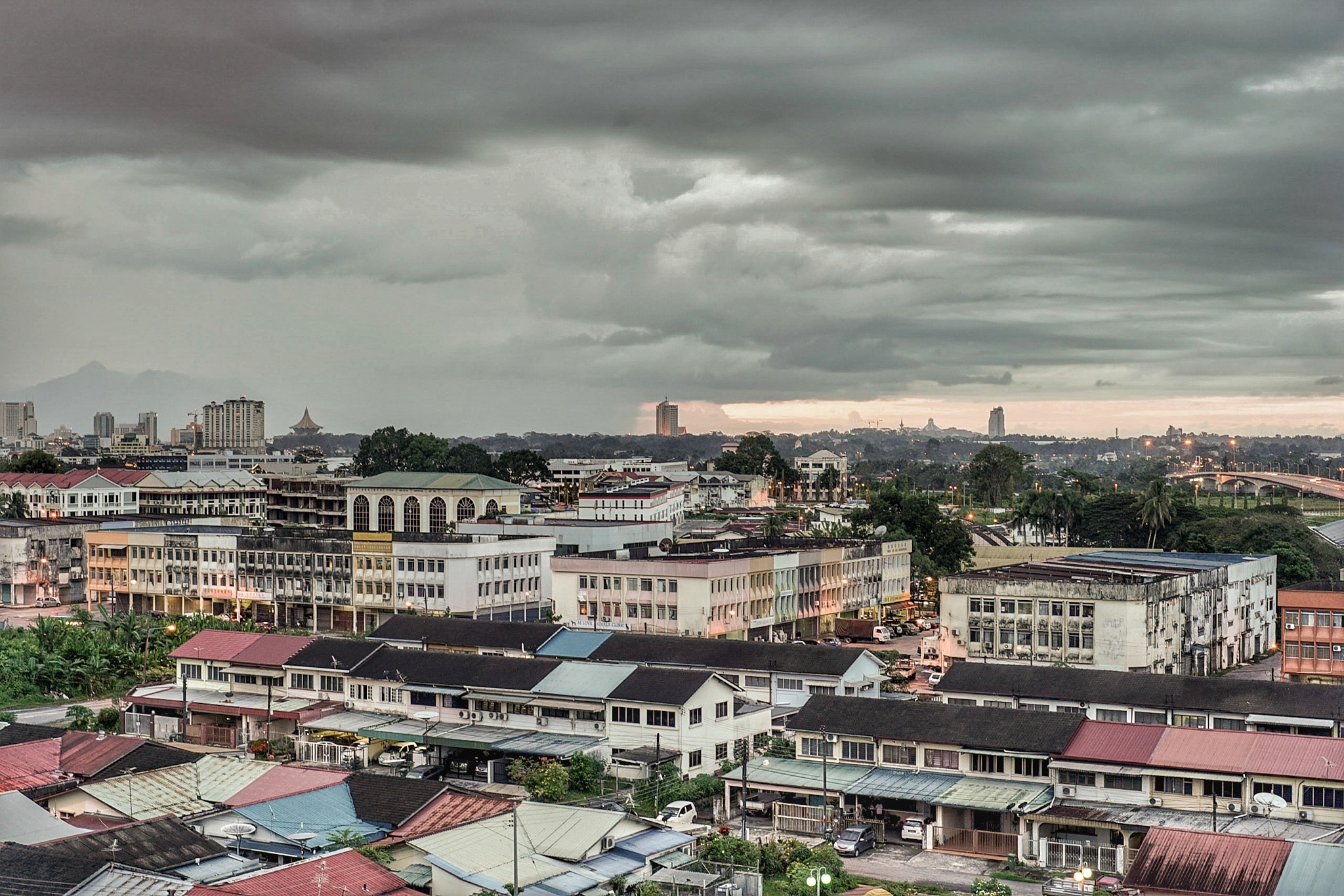 Sony a7 II sample photo. Rain in coming and sunset is going to disappear photography