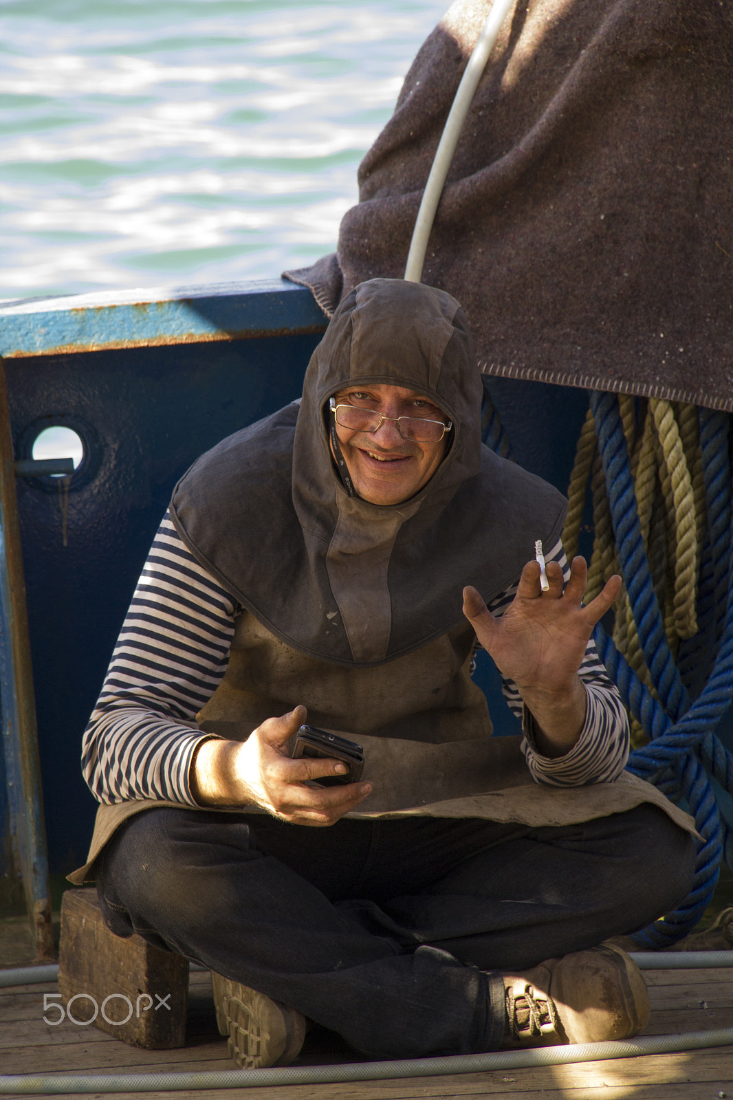 Canon EOS 550D (EOS Rebel T2i / EOS Kiss X4) sample photo. Fisherman on the boat. photography