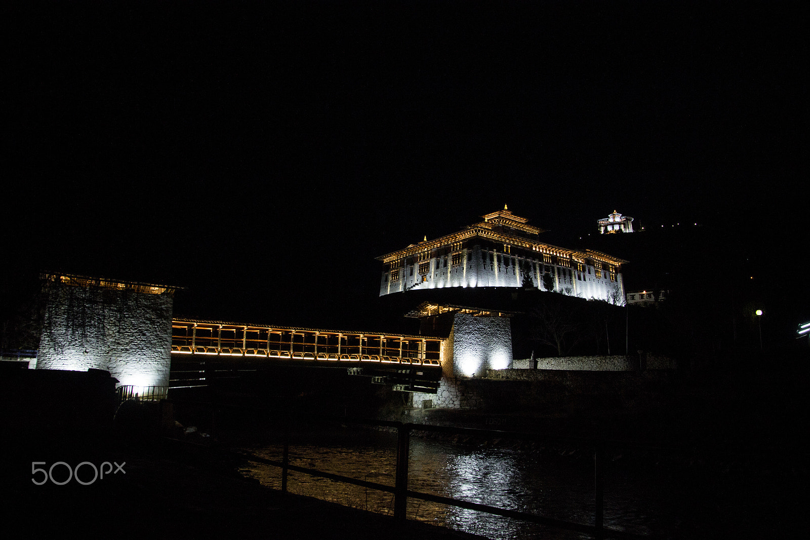 Canon EOS 600D (Rebel EOS T3i / EOS Kiss X5) + Tamron 16-300mm F3.5-6.3 Di II VC PZD Macro sample photo. Paro dzong and watchtower at night photography