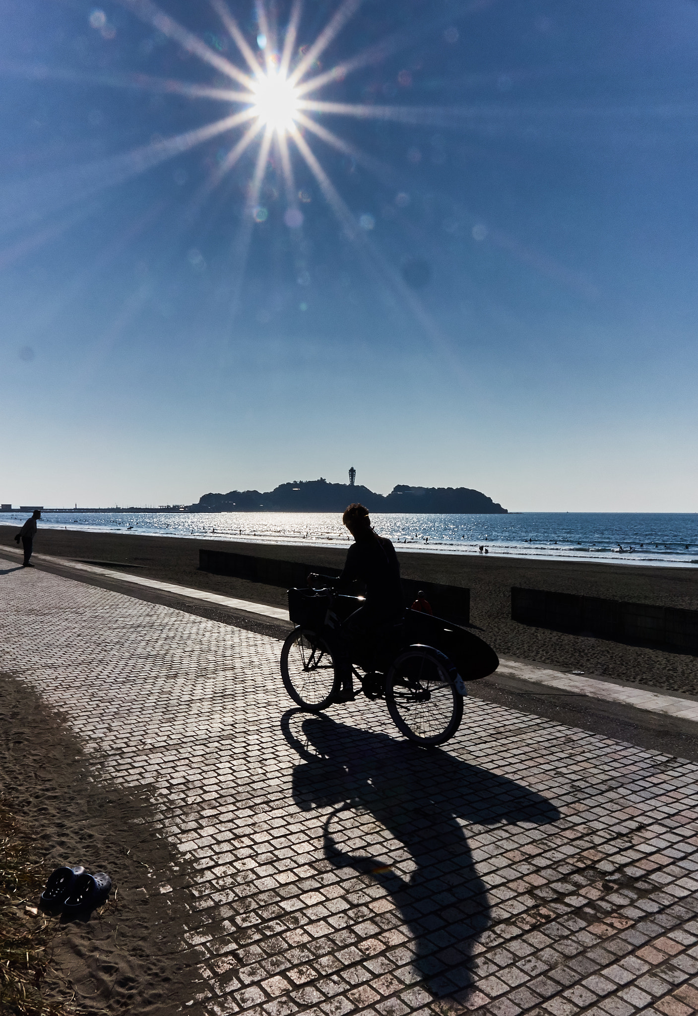 Sony Cyber-shot DSC-RX10 sample photo. Surfer in a winter sunny day photography